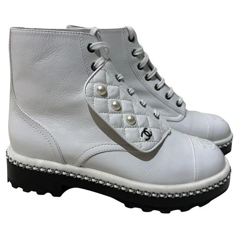 chanel combat boots white|Chanel boots with pearl heel.